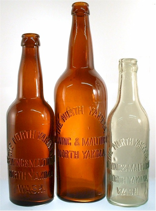 Three No. Yakima B&MCo. crown top beer bottles. 